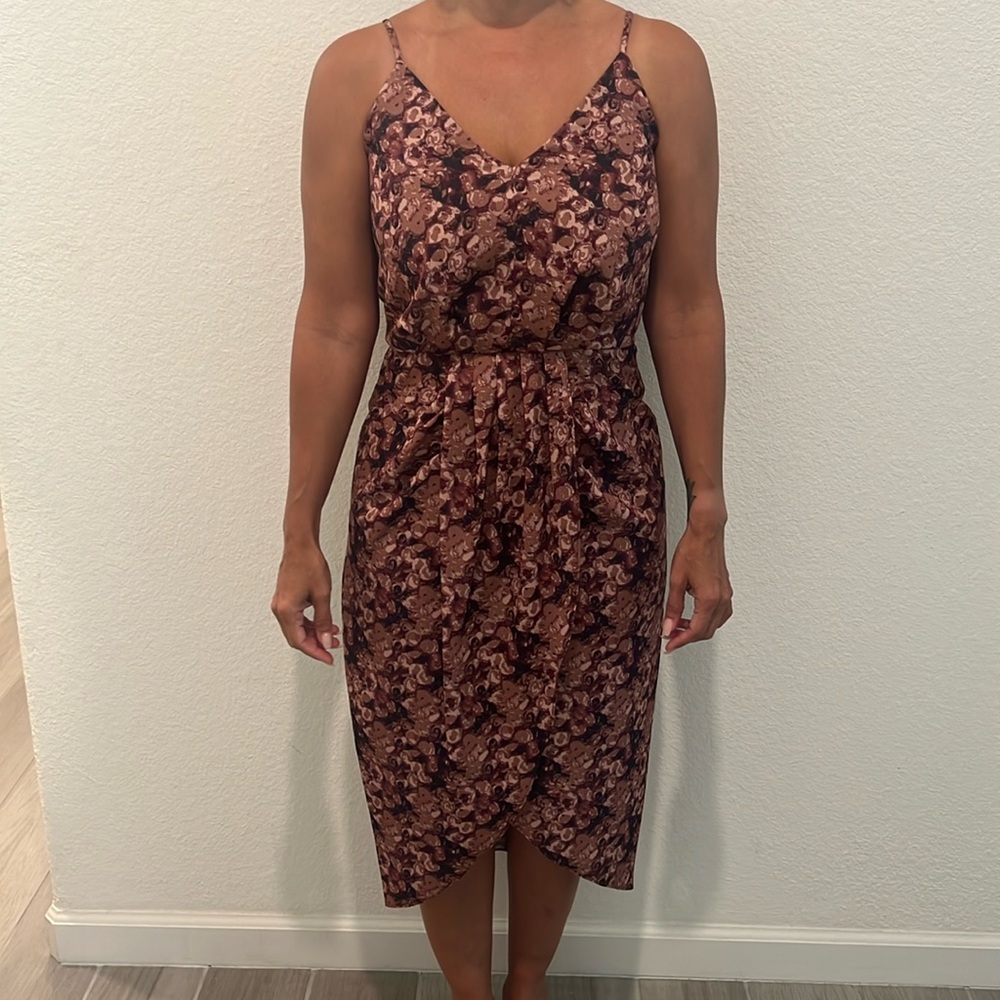Chelsea midi length dress with rouching at the waist.
